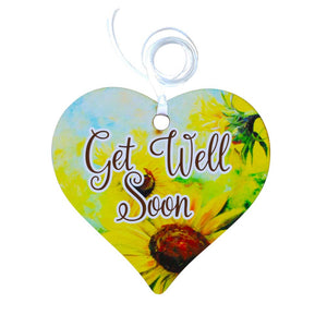 A wooden heart gift tag with a daisy illustration and get well soon message written on across the middle. A wooden heart gift tag with a daisy illustration and get well soon message written on across the middle.