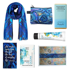 A luxury paua gift box with a paua scarf, chocolates, hand cream and soap. A luxury paua gift box with a paua scarf, chocolates, hand cream and soap.
