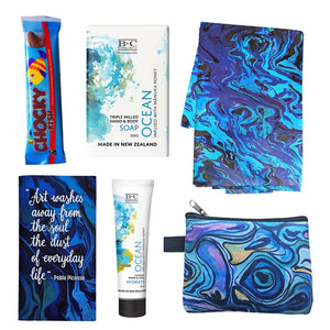 Cool Blue Ocean Gift Box featuring a paua art tea towel, coin purse, notebook, Banks & Co hand cream and soap and a chocolate fish, beautifully arranged in a gift box. Cool Blue Ocean Gift Box featuring a paua art tea towel, coin purse, notebook, Banks & Co hand cream and soap and a chocolate fish, beautifully arranged in a gift box.