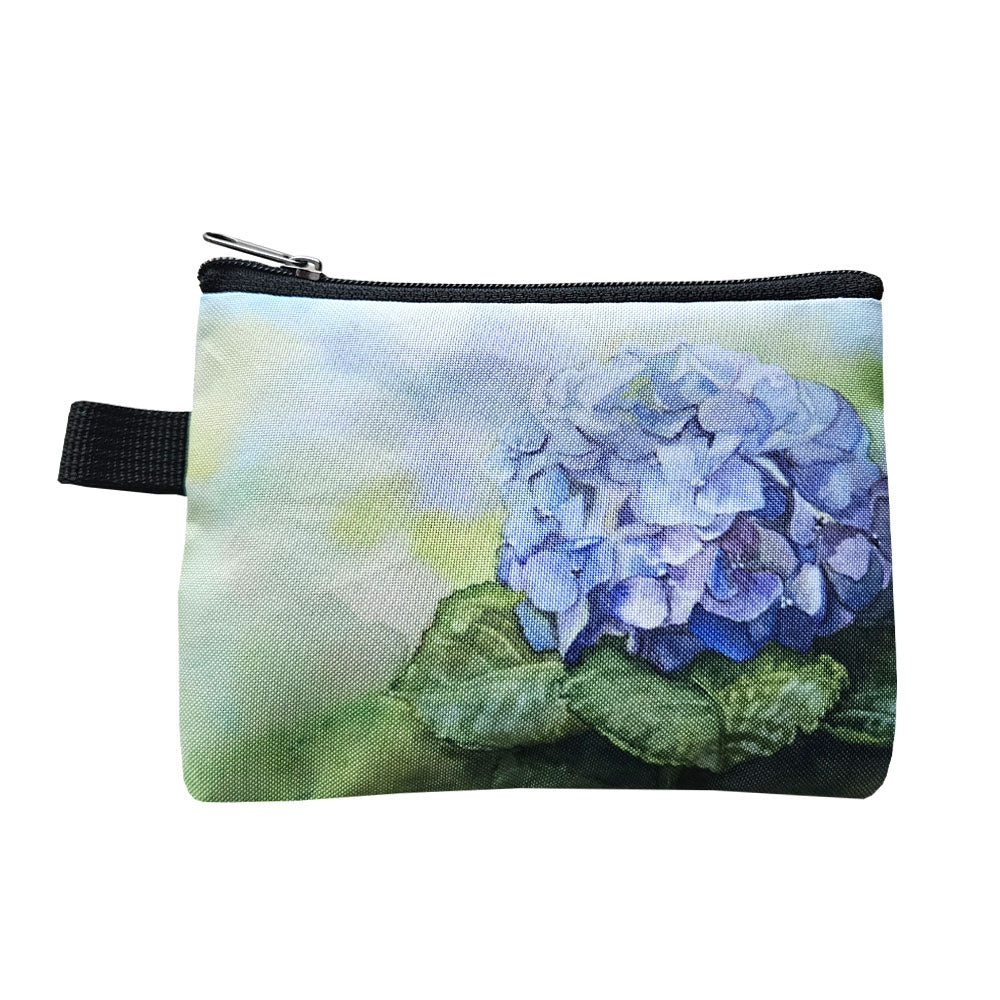 A cute little coin purse with a blue hydrangea print.