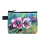 A cute little coin purse with a pink manuka floral print.
