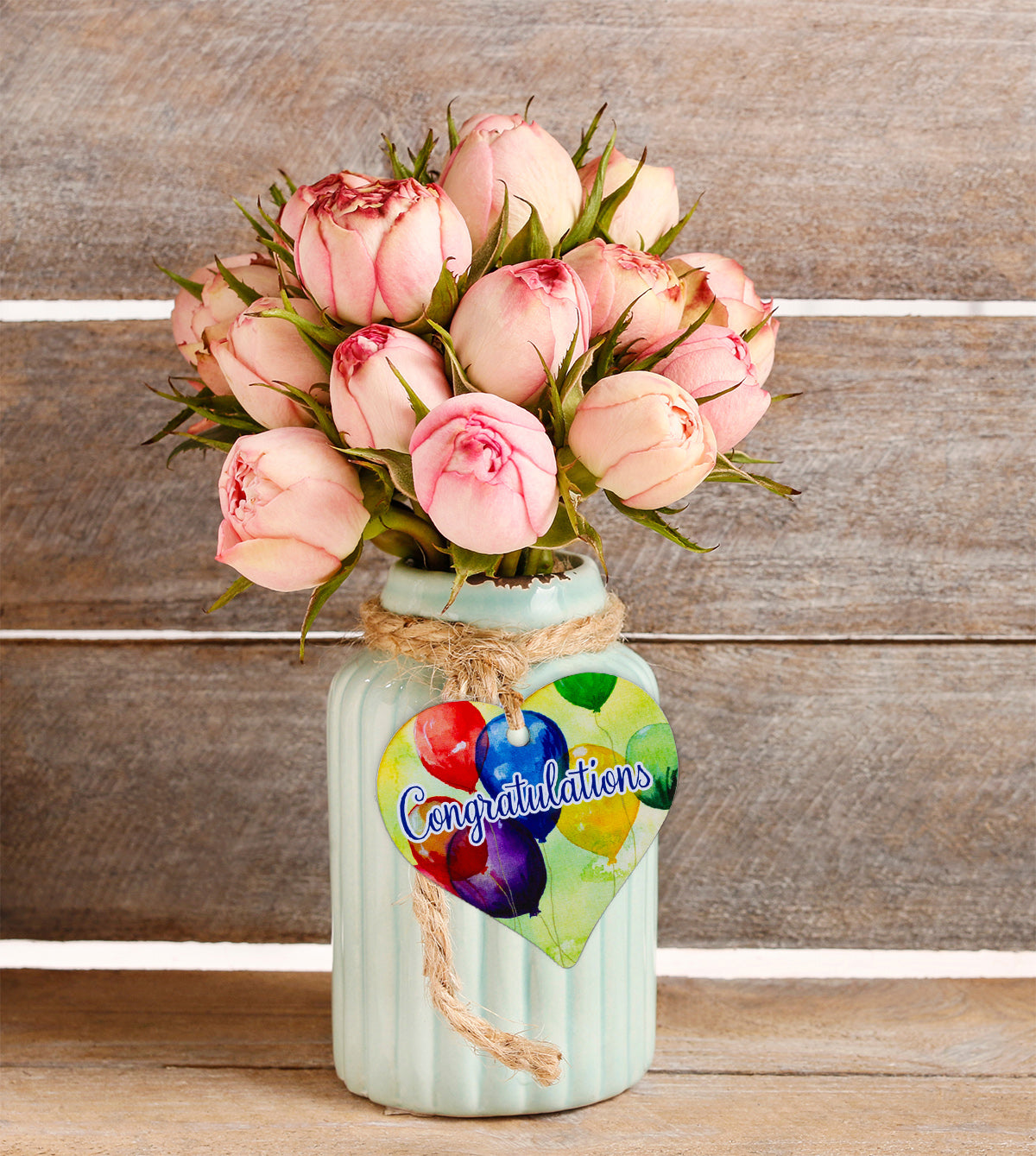 A wooden Keepsake Heart Tag with a balloon design and Congratulations written across the middle.