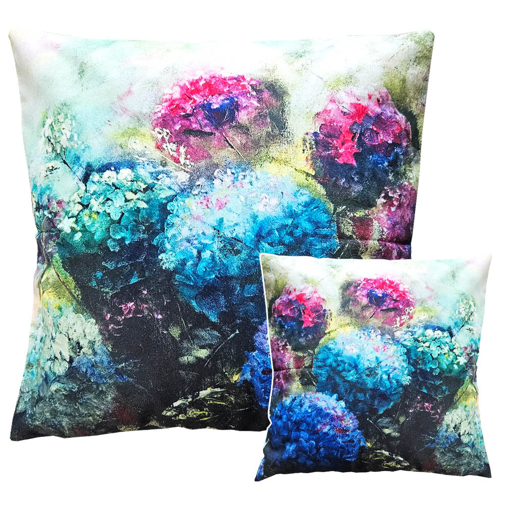 Printed on a stylish velvet look fabric, this cushion captures the vibrant beauty of hydrangeas, adding a fresh and artistic touch to any space.