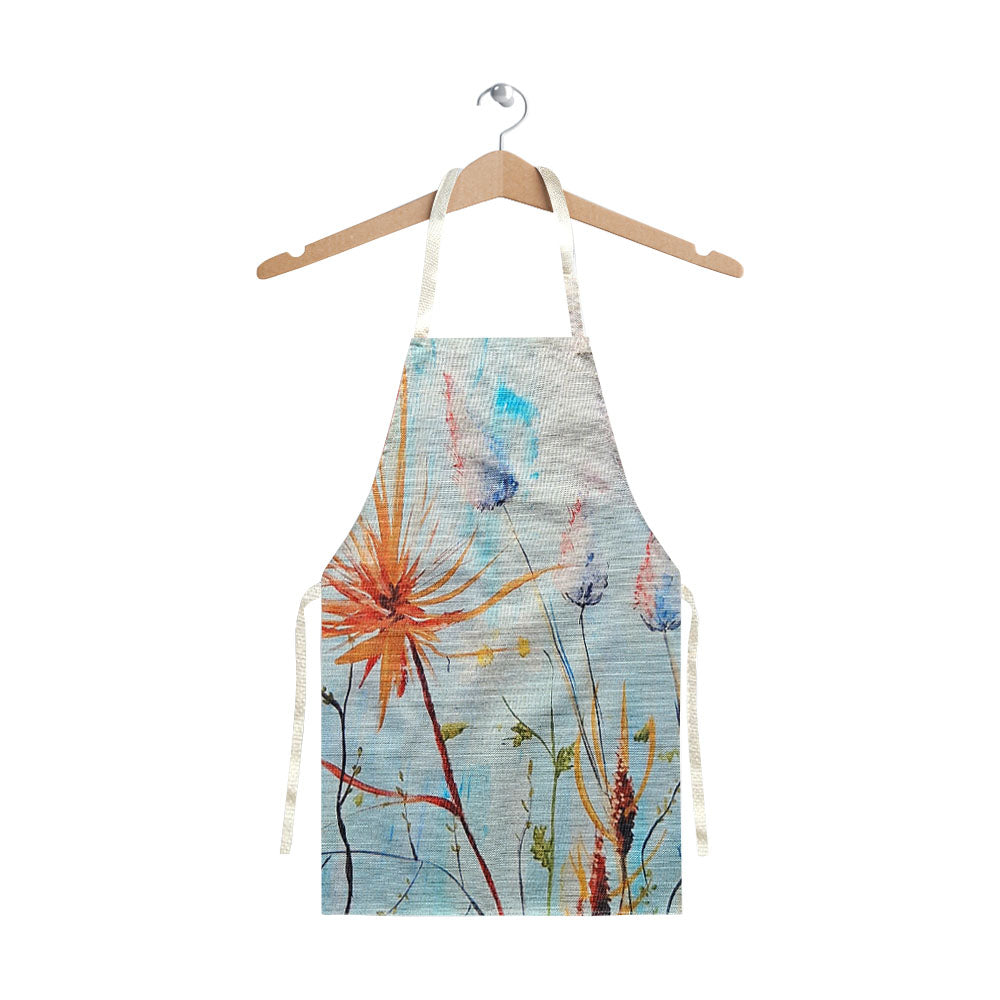 A linen look apron with dune grasses printed . Artwork taken from original artworks by Christina Maassen Art