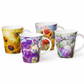 Set of four floral mugs on a white background