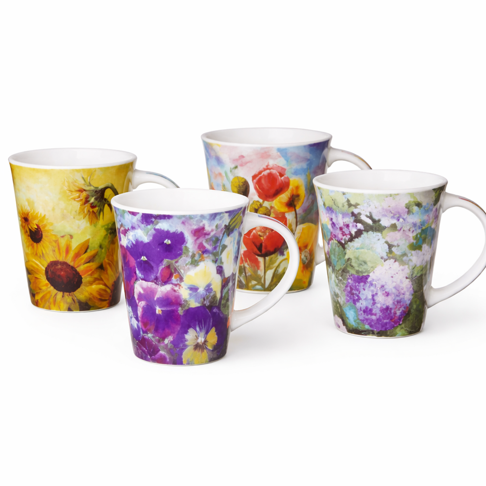 Set of four floral mugs on a white background
