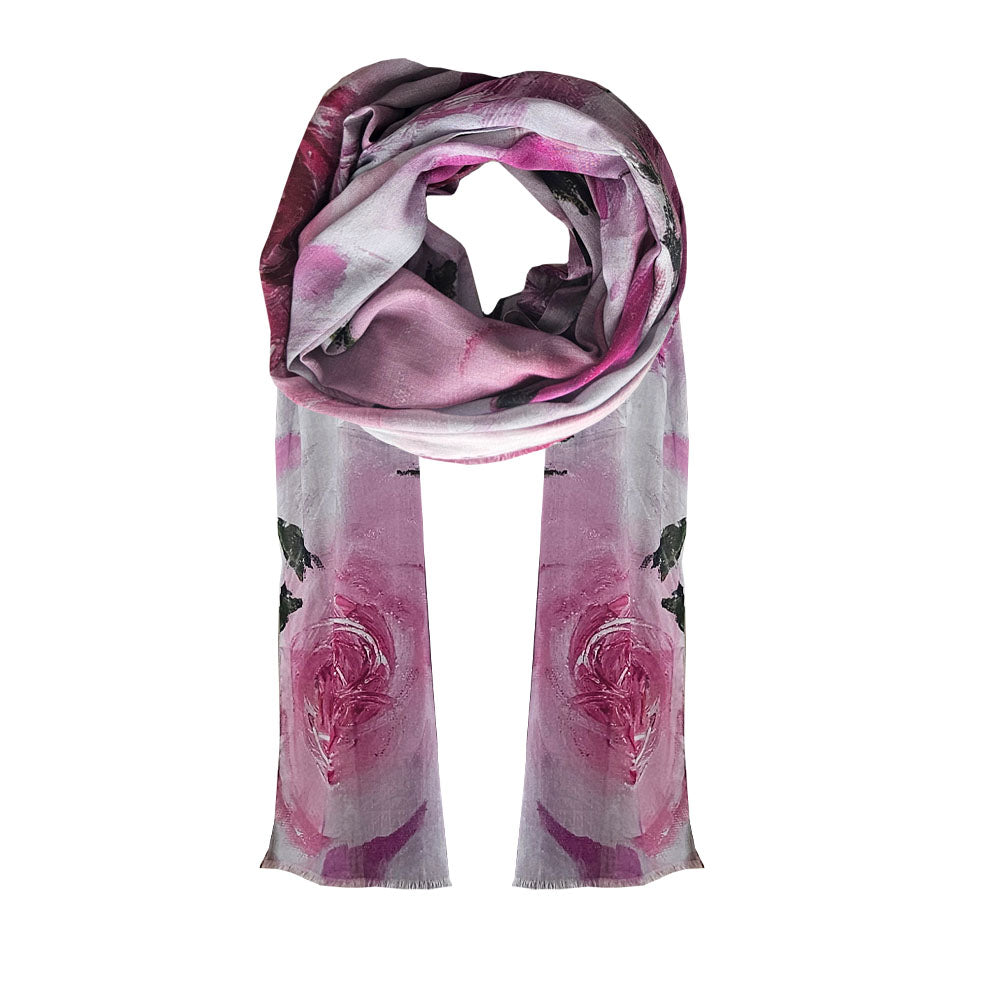 Pink and white design with a beautiful rose design printed throughout. Soft delicate Colours perfect to dress up or down.