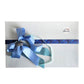 A luxury paua gift box with a paua scarf, chocolates, hand cream and soap.