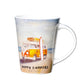Mug with a design of a camper van and surfboard on a beach, featuring the text 'Happy Campers Kiwi Style'.