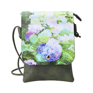 Crossbody bag with  Hydrangea floral design on top and green base.