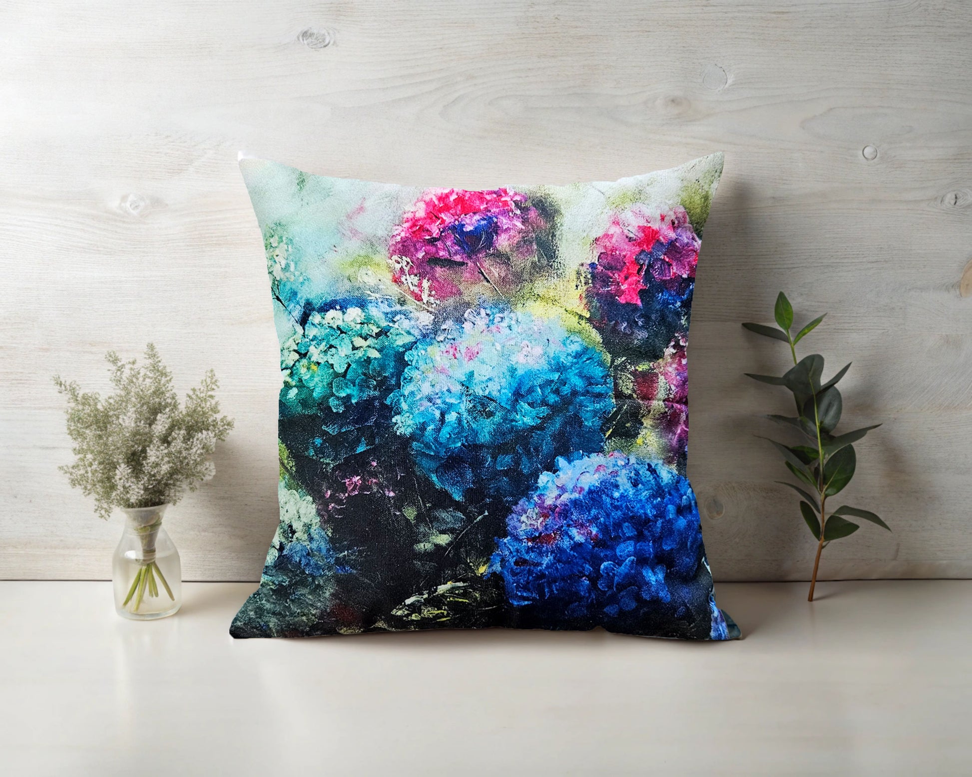 Printed on a stylish velvet look fabric, this cushion captures the vibrant beauty of hydrangeas, adding a fresh and artistic touch to any space.