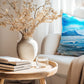 Printed on a stylish linen look fabric, this cushion captures the essence of coastal beauty, making it a perfect addition to any space.