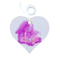 A wooden heart gift tag with a pink bunny illustration and written message of It's a Girl.
