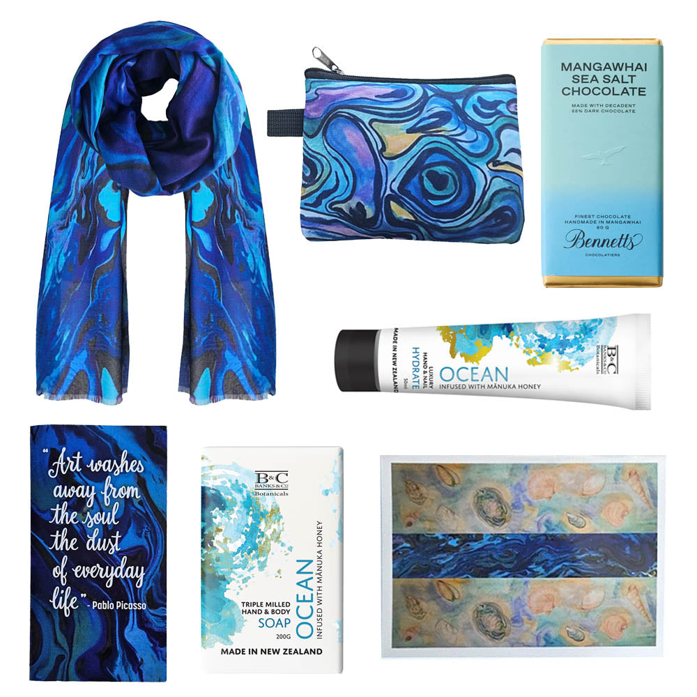 A luxury paua gift box with a paua scarf, chocolates, hand cream and soap.