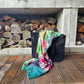 A merino wool scarf with a manuka flower design, artwork is take from original artworks from Christina Maassen Art