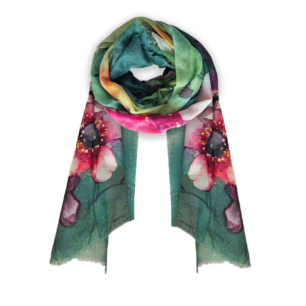 A merino wool scarf with a manuka flower design, artwork is take from original artworks from Christina Maassen Art