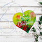 A wooden Merry Christmas Pohutukawa Heart keepsake gift tag