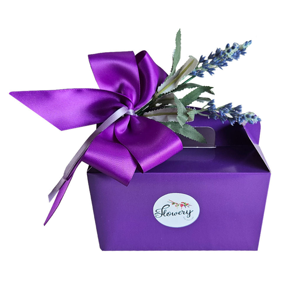 A Lavender themed gift box with chocolates, soap, hand cream and coin purse. 