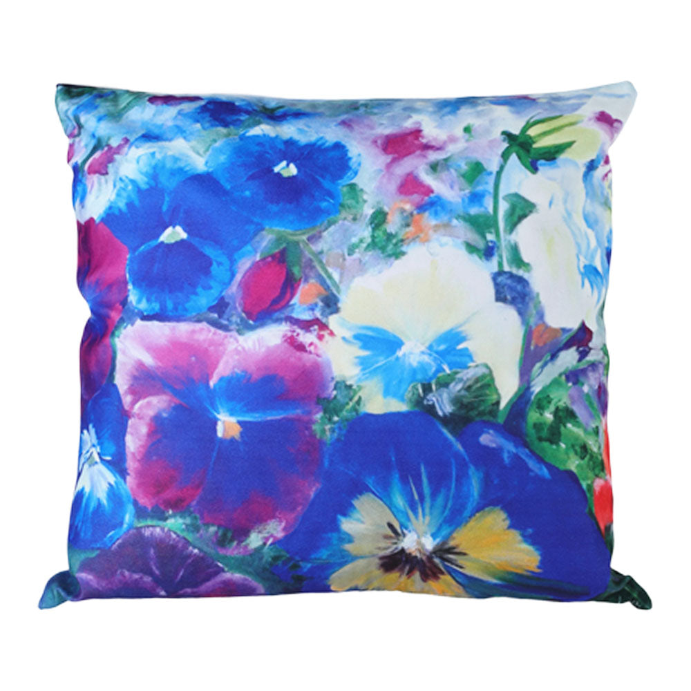 Floral pansies design pillow with vibrant colors on a white background