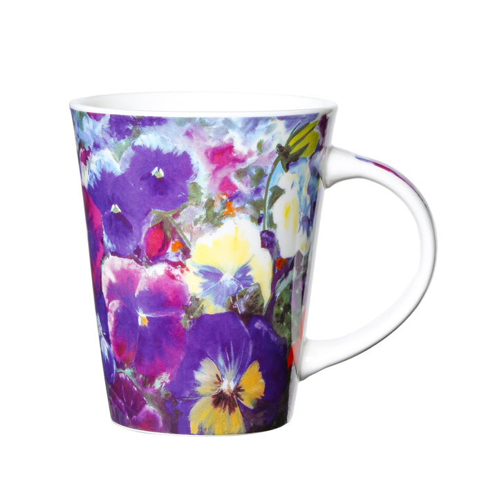 Mug with a colourful Pansy floral design on a white background