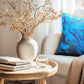 Paua print linen cushion with an abstract paua design. 