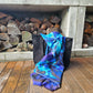 An abstract paua printed cotton scarf. Beautiful shades of blue marble design.