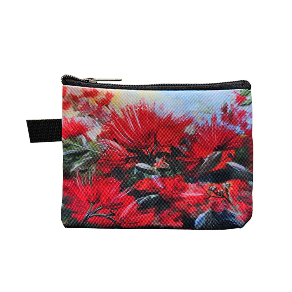 Red coin purse with a New Zealand native Pohutakawa design.
