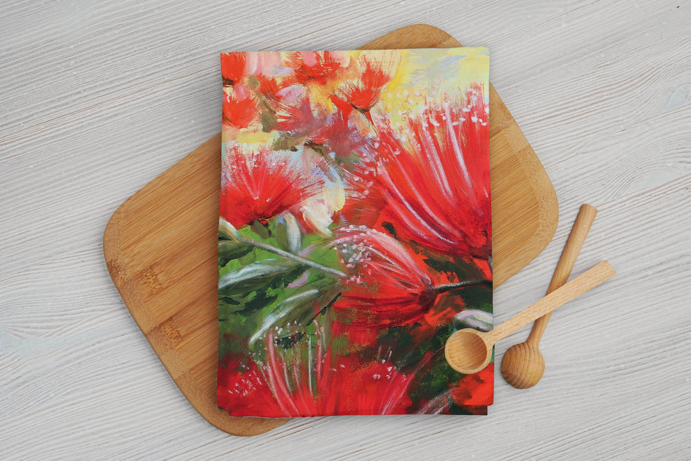 Pohutukawa cotton Tea Towel print beautiful red, greens and white design print with artworks taken from Christina Maassen Art.