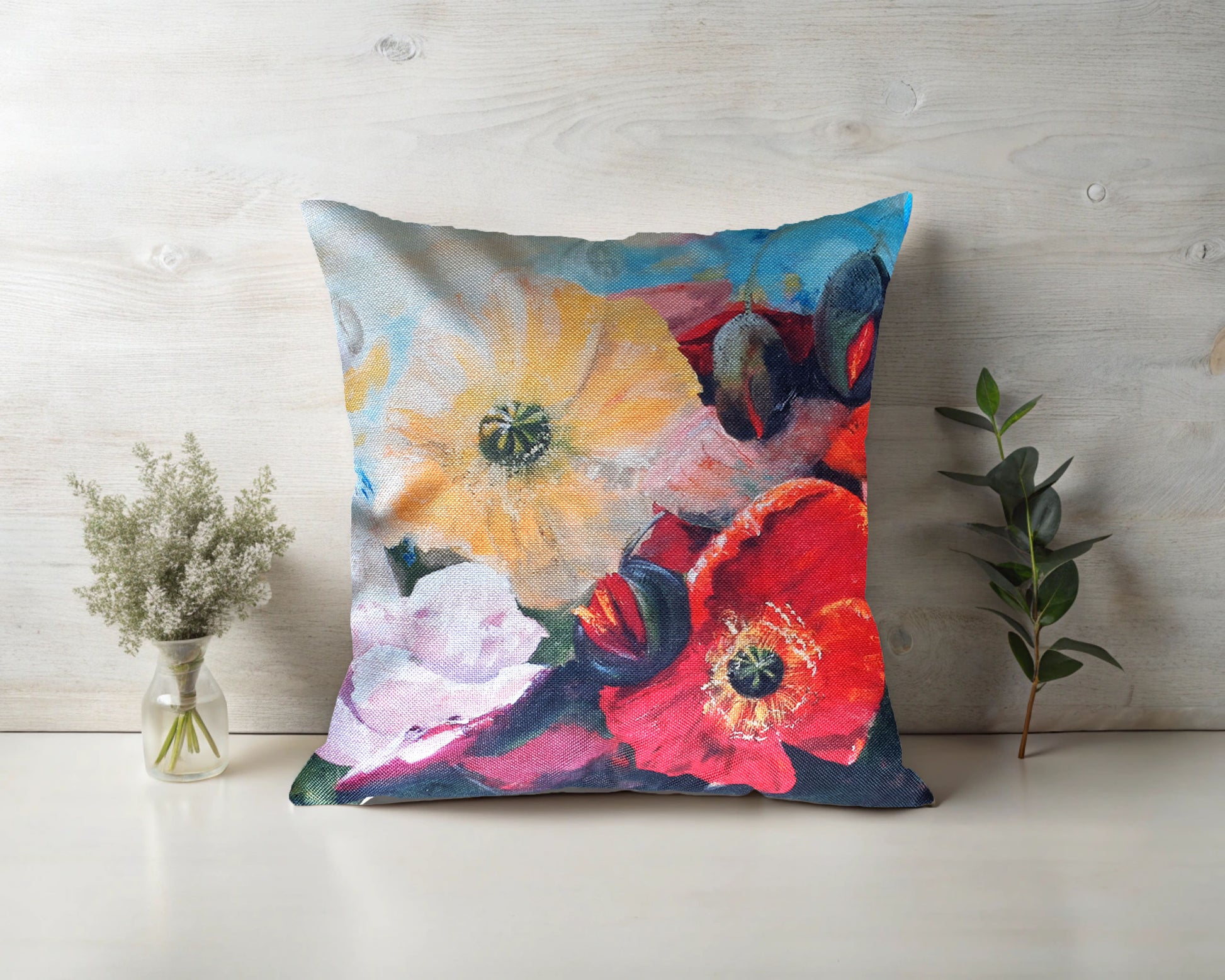 Printed on a stylish linen look fabric, this cushion showcases bright, vibrant blooms that add a fresh and artistic touch to any space.