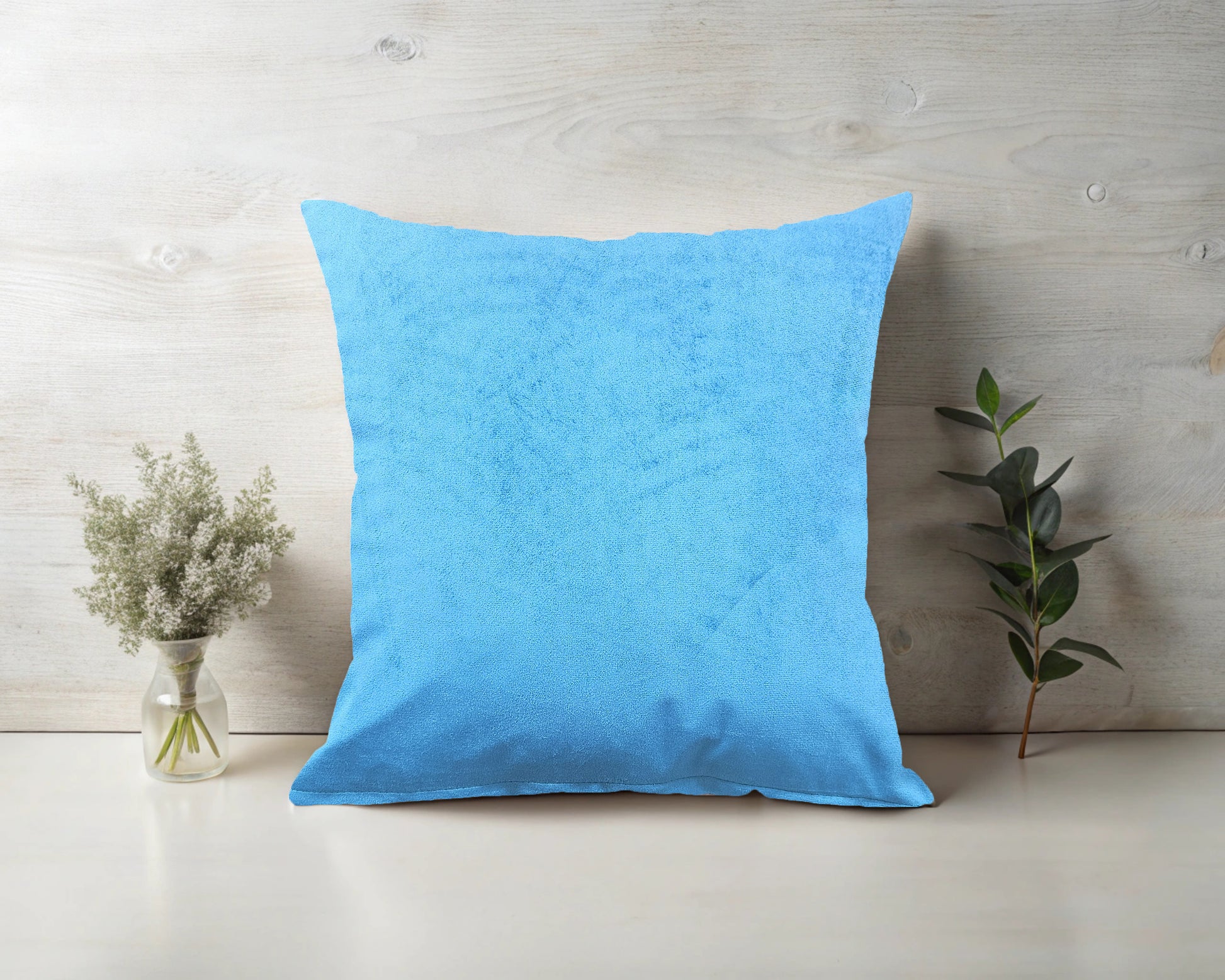 A soft Aqua velvet cushion
