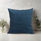 A teal coloured Satin cushion with inner.