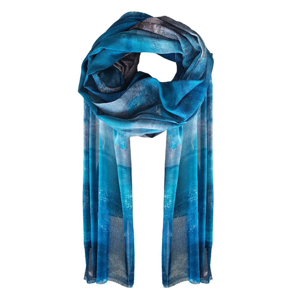An Abstract Scarf design with inspiration taken from the beach. Blues, greys and whites blending together to create a beautiful cotton scarf design.