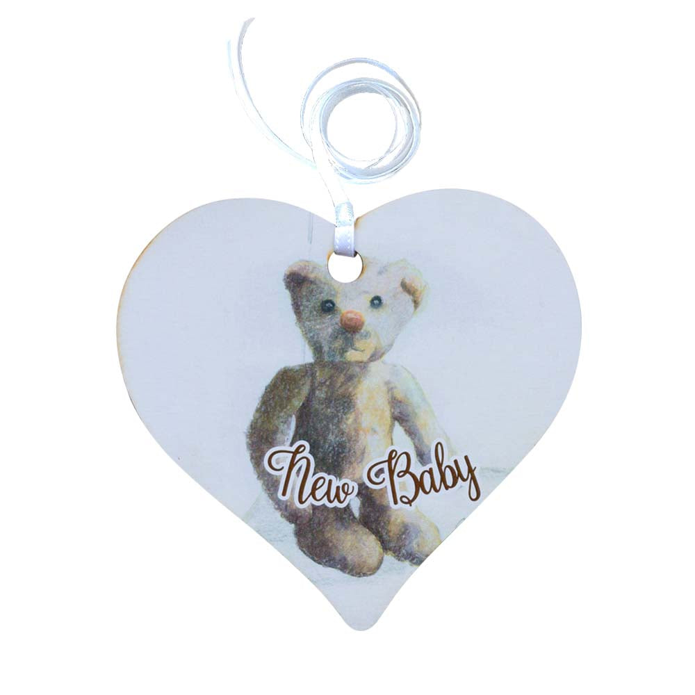 A wooden gift tag with a teddy bear illustration and the words New Baby written at the bottom. 