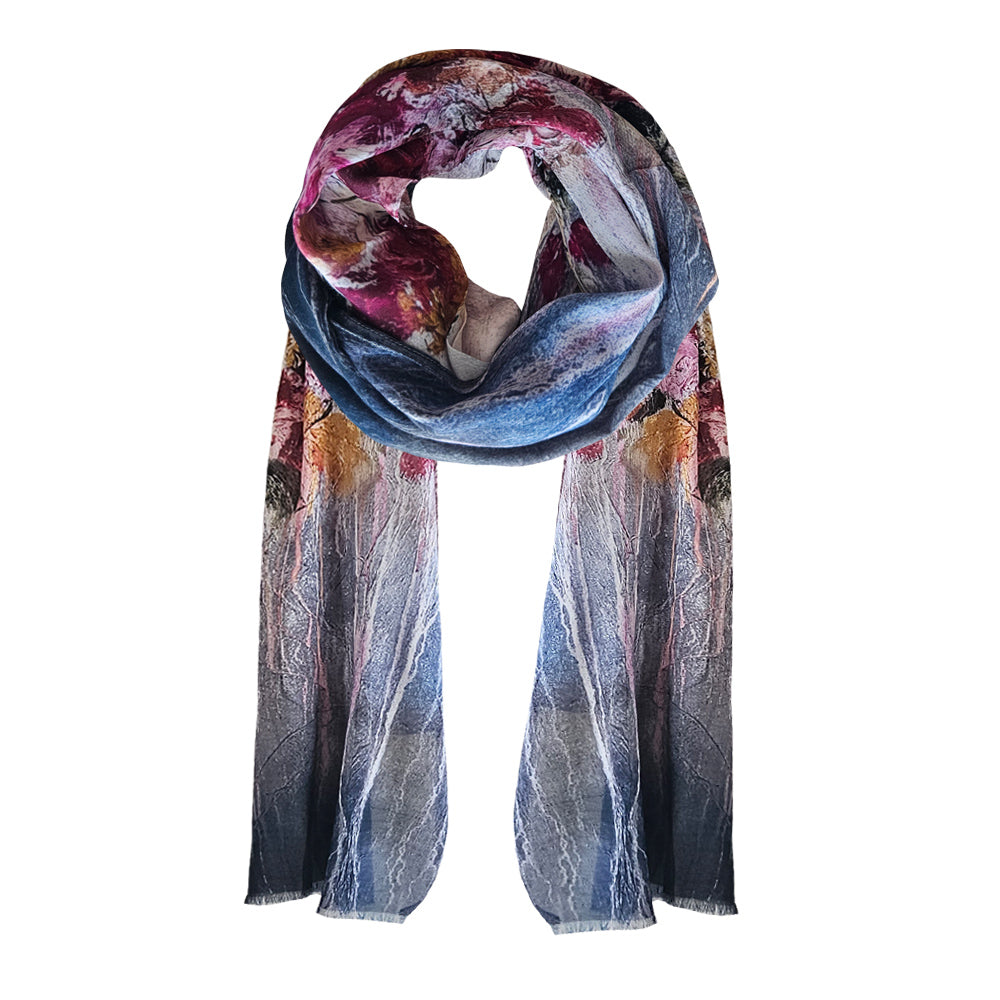 With a darker colour palette this scarf beautifully showcases a collection of different flowers. 