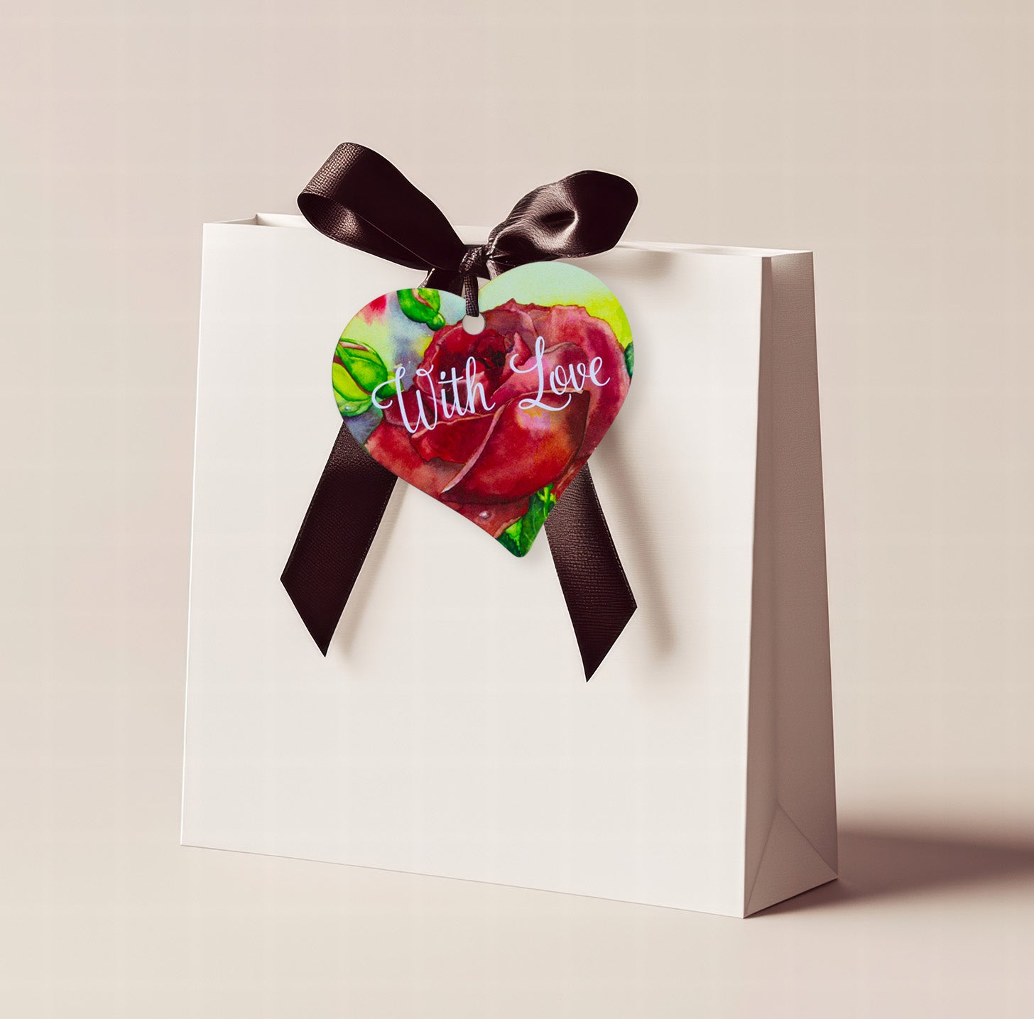 A wooden heart tag with the message 'with love' and a red rose design.