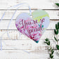 A wooden heart gift tag with a pink rose design and the message you're so special.
